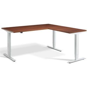 L Shaped Sit Stand Desk - Advance Corner - White Frame - Natural Dijon Walnut Top - Studio Image