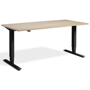 Lavoro Advance Height Adjustable Desk - Black Frame - Natural Oak Top - Studio Image