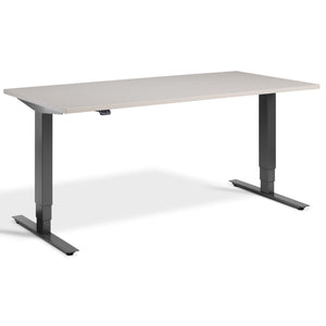 Lavoro Advance Height Adjustable Desk - Dark Grey Frame - Cashmere Top - Studio Image