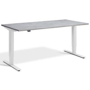 Lavoro Advance Height Adjustable Desk - Light Grey Frame - Light Concrete Top - Studio Image