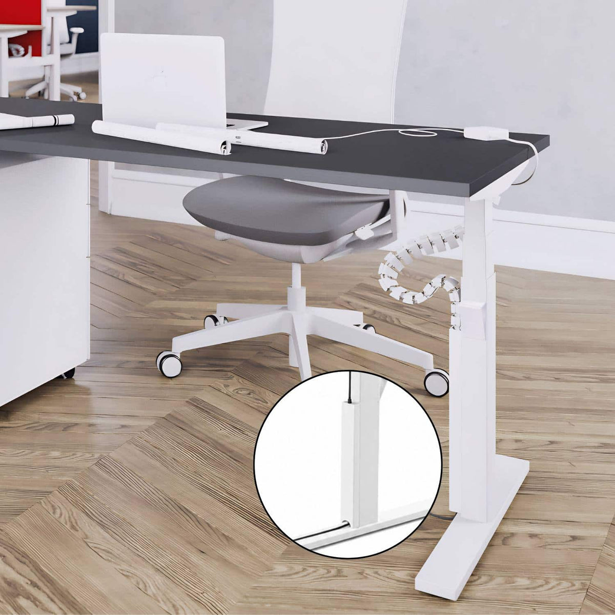 Leap magnetic cable protector fitted to a white standing desk in an office setup
