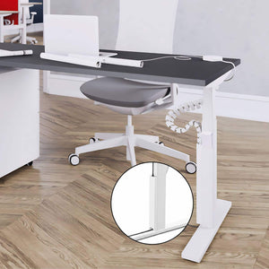 Leap magnetic cable protector fitted to a white standing desk in an office setup