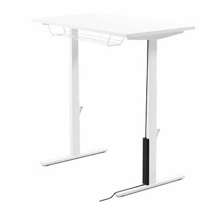 Leap magnetic cable protector in black fitted to a white standing desk