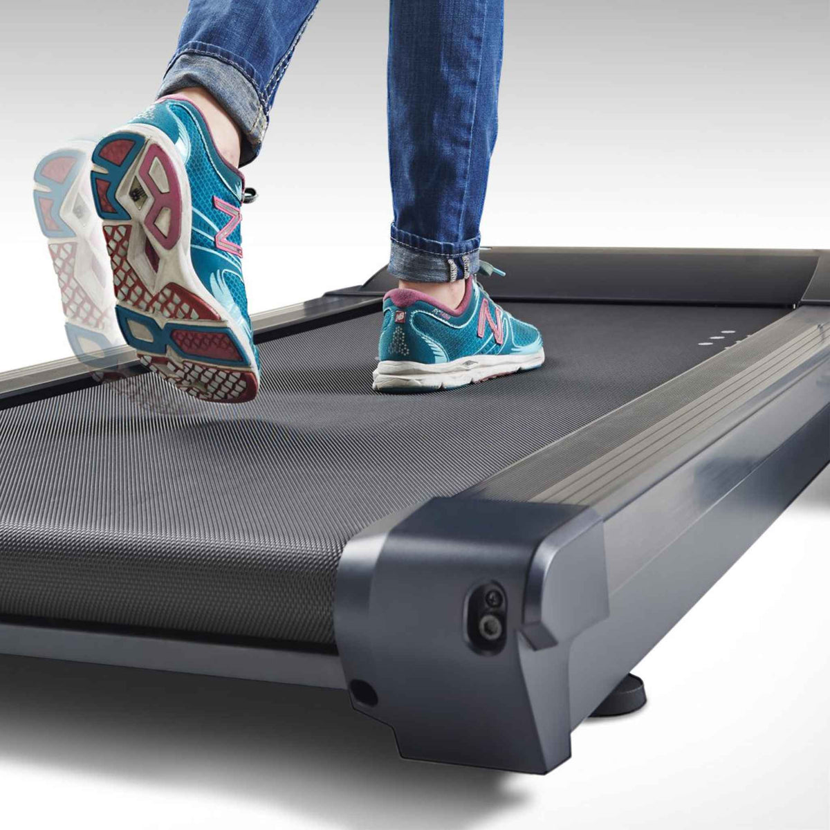 Lifespan TR1200 Pro glowup under desk treadmill in use viewed from rear