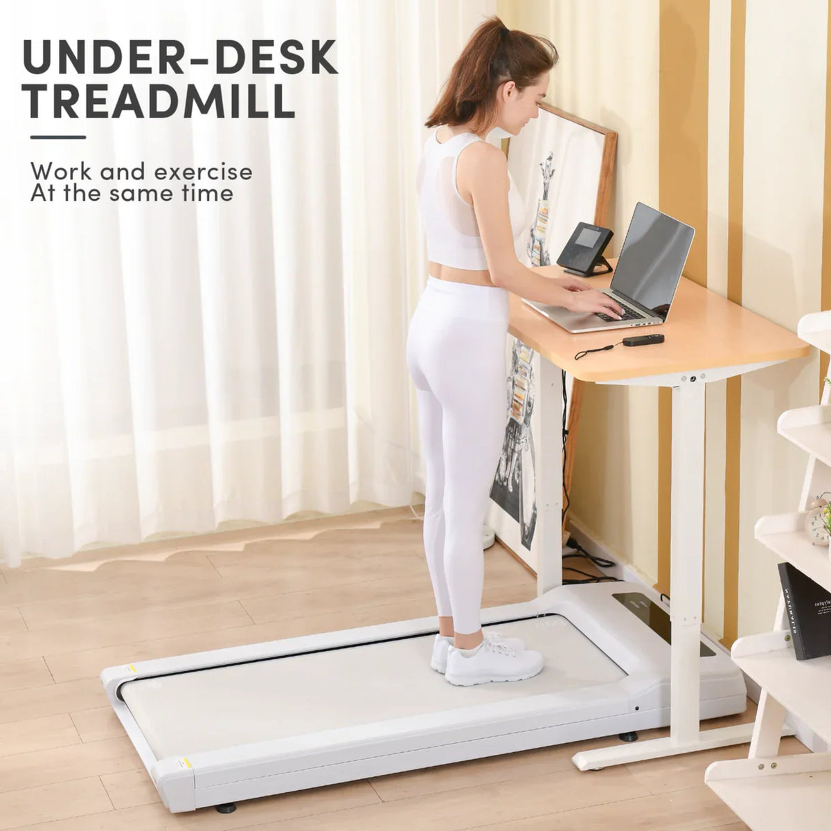 Lifespan Walking Pad - Woman using the treadmill while working at her desk