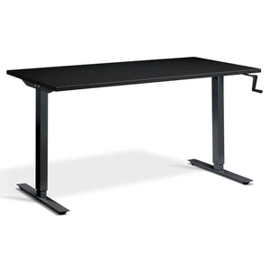 Manual crank standing desk with a black desk top, black frame and side-mounted crank handle