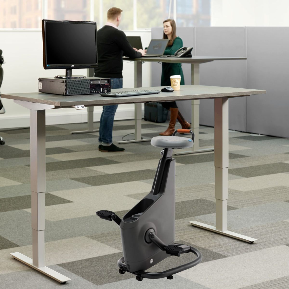 Office Bike Desk - Masta Spin - Showing the height adjusted Masta Desk and the side view of the Ampera Bike