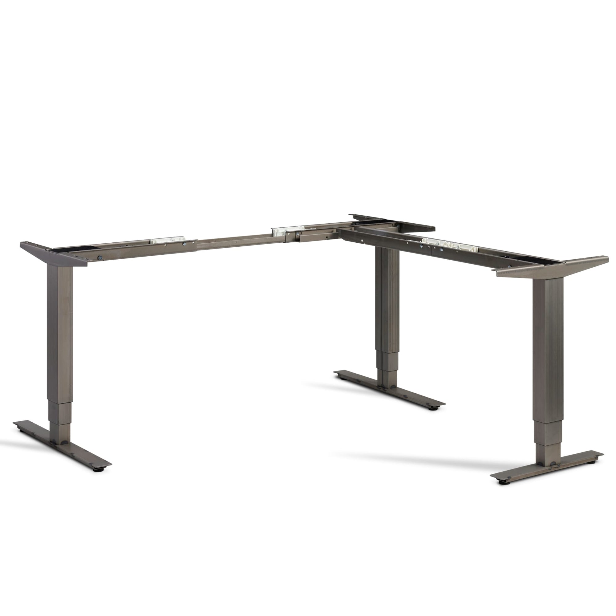 Masta corner standing desk frame in raw steel finish viewed from the front