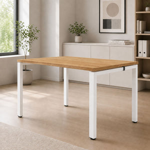 Single office desk with oak desktop and white frame shown in a modern office setting