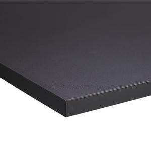 soft black desk worktop viewed from corner
