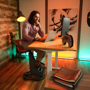 Standing Desk with Bike - Rize Spin - Man Riding the Bike While Working at the Desk