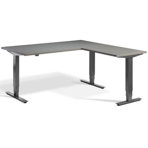 Standing L Desk - Advance Corner - Dark Grey Frame - Graphite Top - Studio Image