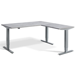 Standing L Desk - Advance Corner - Silver Frame - Light Concrete Top - Studio Image