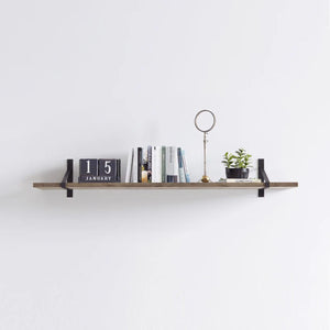 Suspense shelf brackets, black finish, wall shelf styled with books