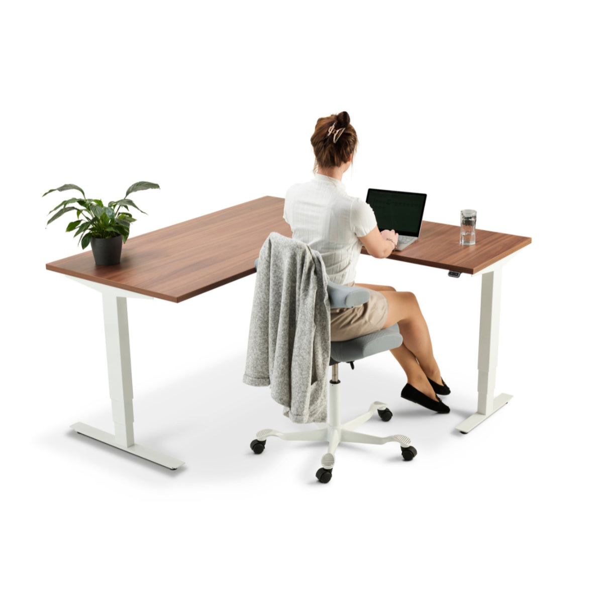 Walnut Corner Sit Stand Desk - Masta Corner - Woman working on the Desk