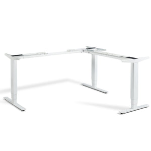 White Lavoro Advance standing corner desk frame viewed from the front