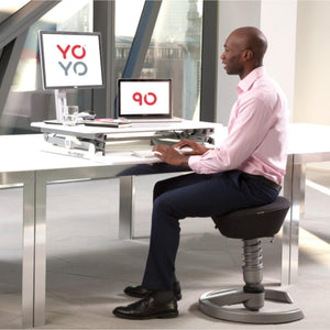 Yo Yo Desk 90 - Man Using the White Colour Variant of Desk 90 while Typing