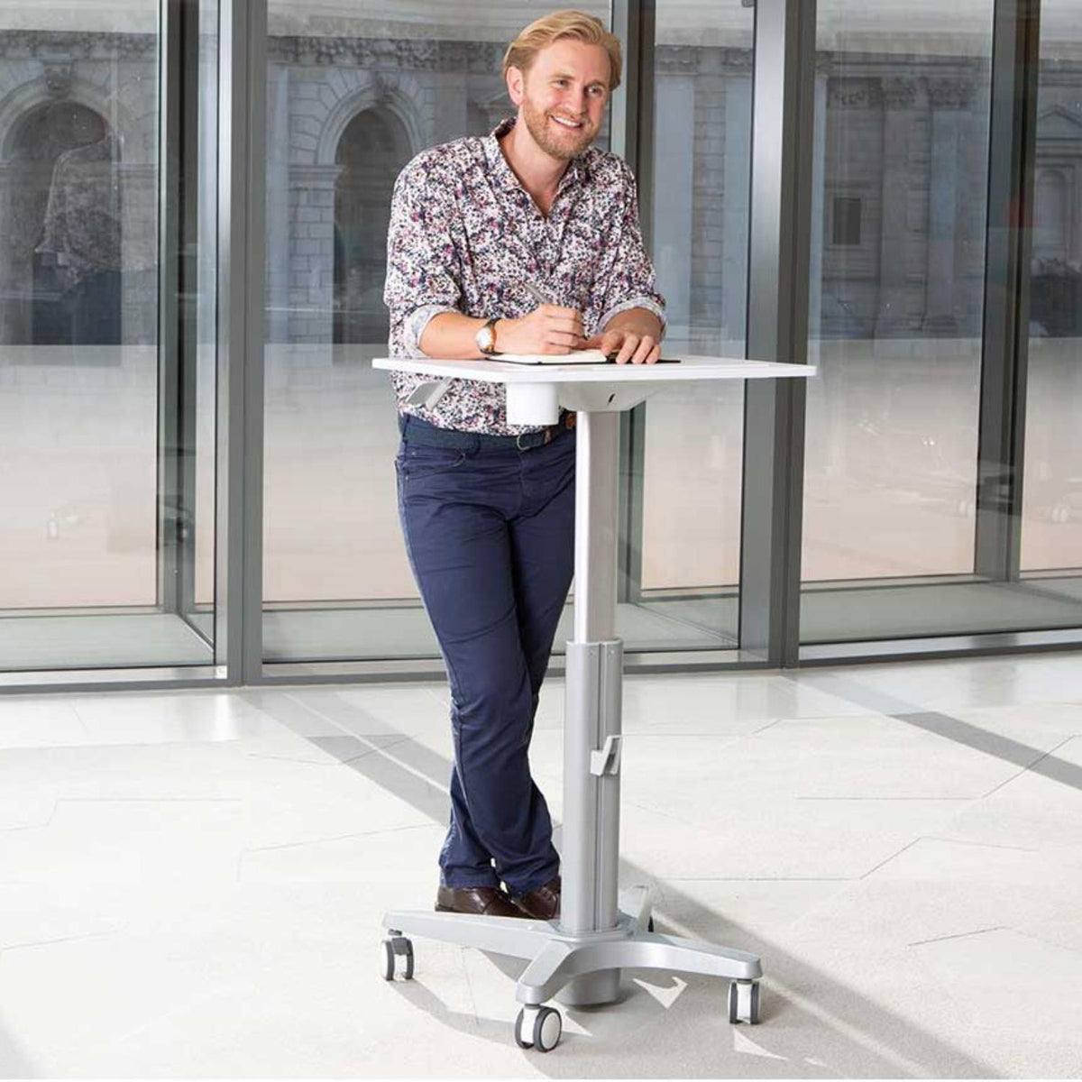 Yo-Yo Learn Standing Desk - Man using the White Variant of Standing Desk