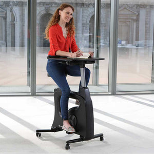 Yo-Yo Bike Desk - Woman using the Black Vairant of Bike Desk