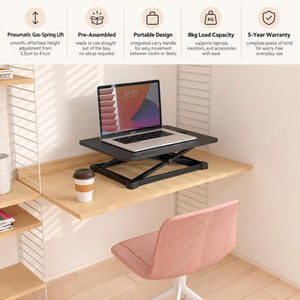 Yo Yo Desk Lite height adjustable workstation with laptop, highlighting gas-spring lift, portable design and pre-assembled construction