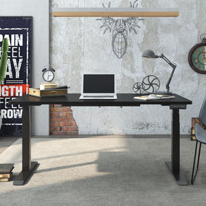 Kinetik2 sit stand desk with black top in use in an office environment