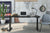 Kinetik-2 dual motor sit stand desk frame in a home environment