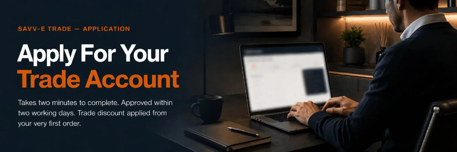 Promotional banner for Savvy-E Trade featuring the text 'Apply For Your Trade Account' in white and orange on a dark background, alongside a man in a business suit working on a laptop at a desk.