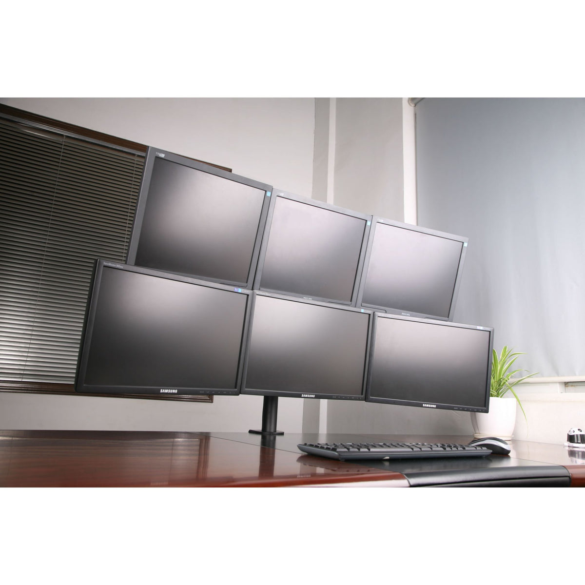 Six Screen Monitor Stand - Metalicon Duro Heavy Duty in use